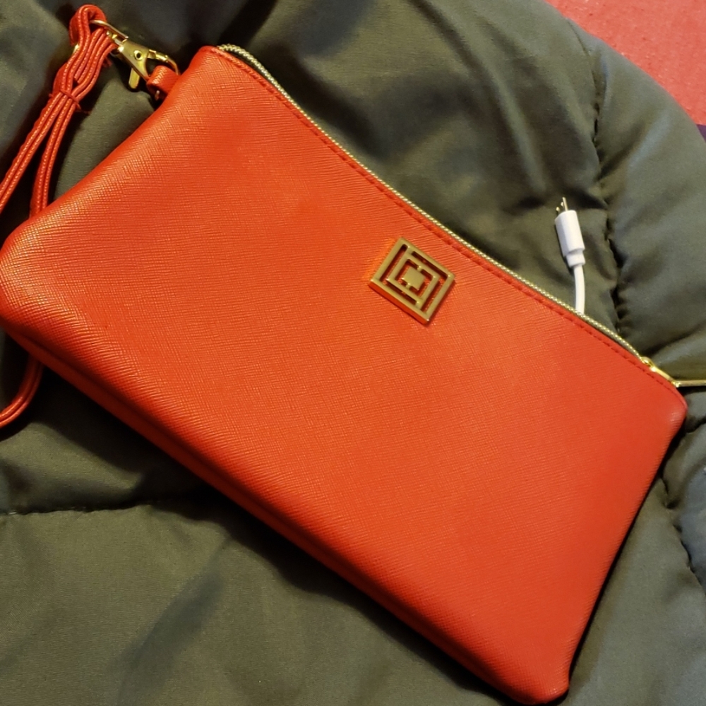 Large wristlet with attached usb charger